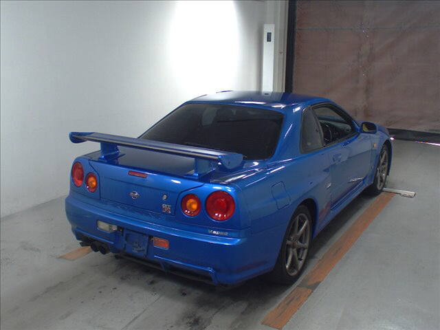1999 Nissan Skyline R34 GT-R VSpec TV2 Bayside Blue auction right rear
