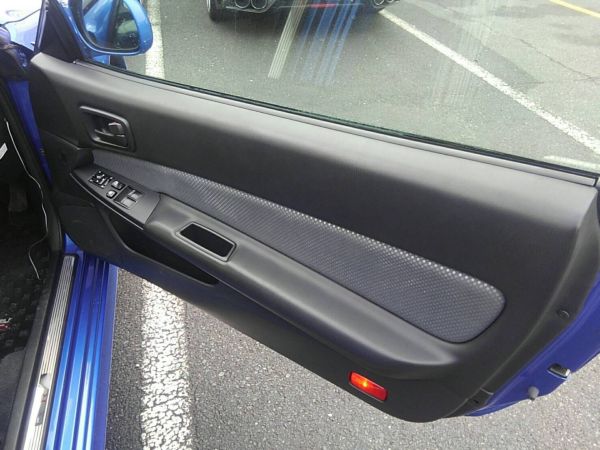 1999 Nissan Skyline R34 GT-R VSpec TV2 Bayside Blue right door card