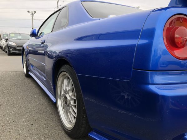 1999 Nissan Skyline R34 GTR VSpec Bayside Blue left rear quarter