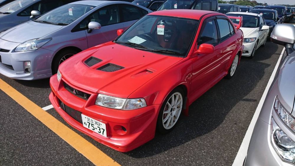 2000 Mitsubishi Lancer EVO 6 TME red left front